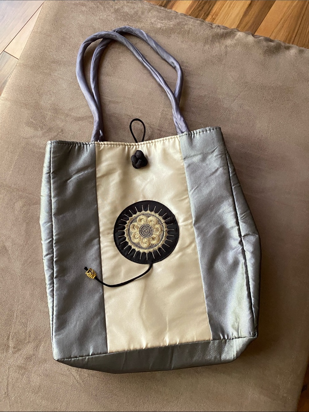 Elegant Two-Tone Gray and Cream Tote Bag with Decorative Medallion